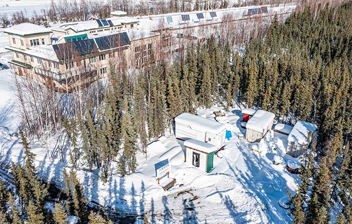 Aerial view of buildings in the snow