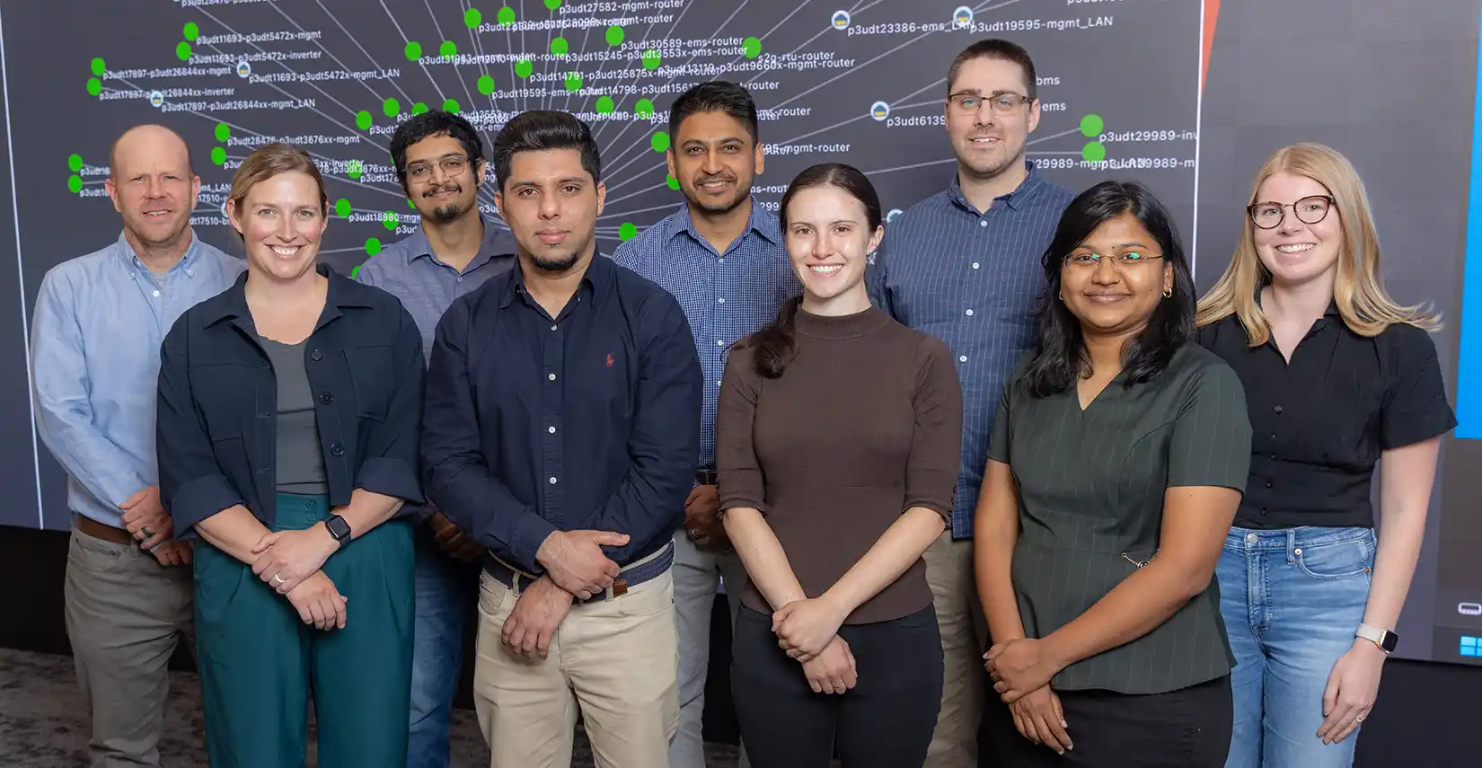 Group of researchers pose for photo in the lab.