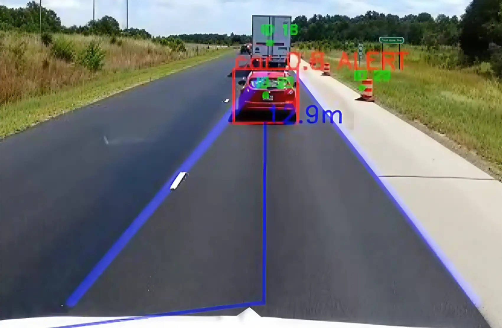 Dashboard camera footage highlights a small red car tailgating a truck by putting a digitally-produced red square around it.