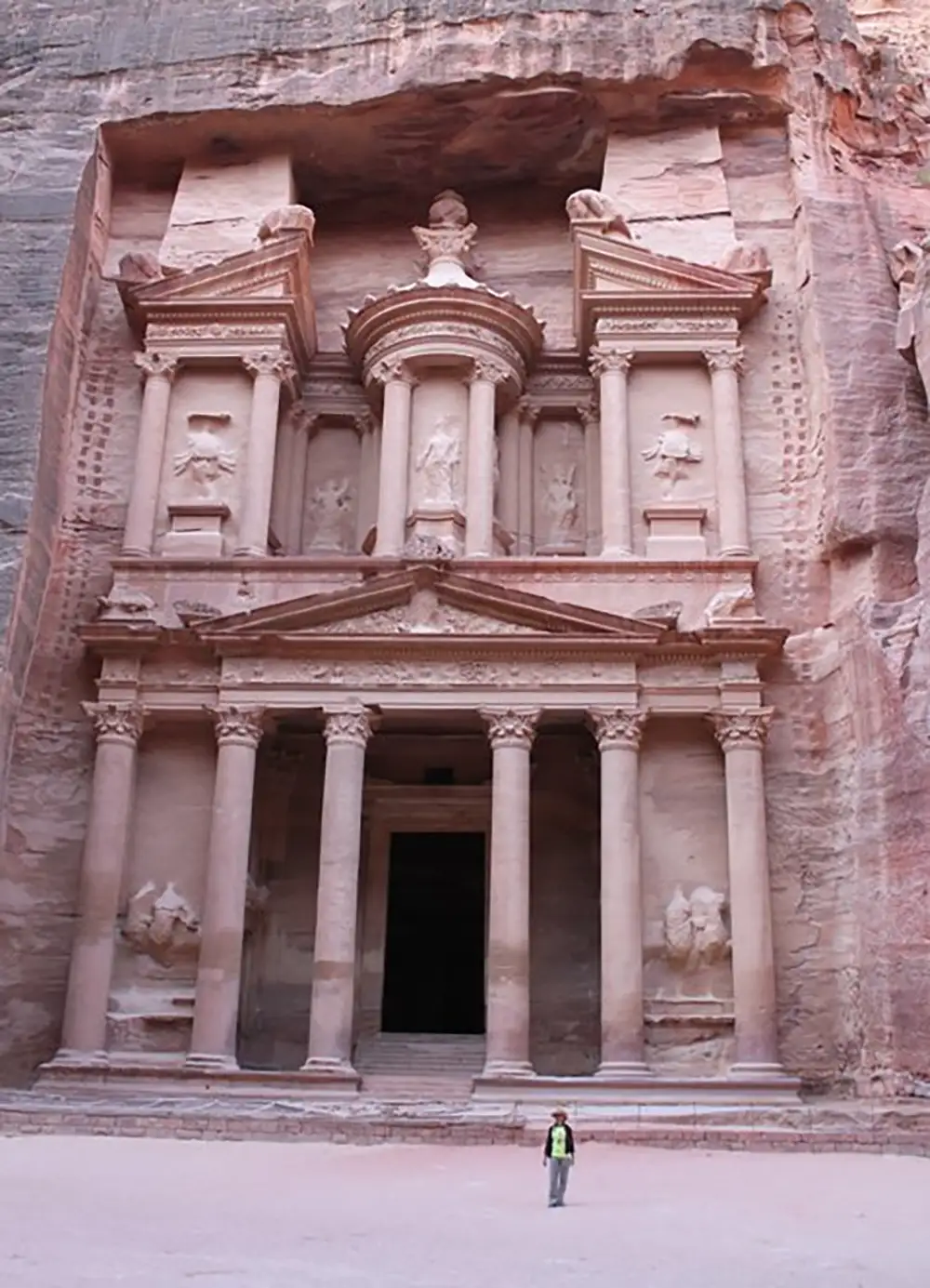 20250916-love-of-biology-fuels-kristi-moriarty-career-nrel-petra-2 A person standing in front of a large facade with columns.