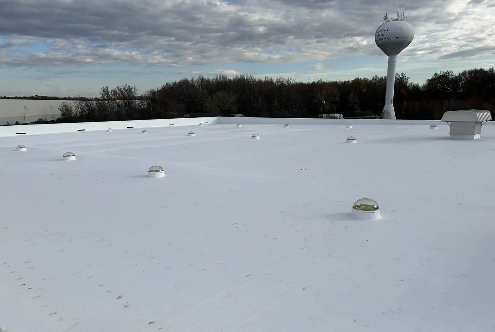 A wide view of a rooftop with a white coating.