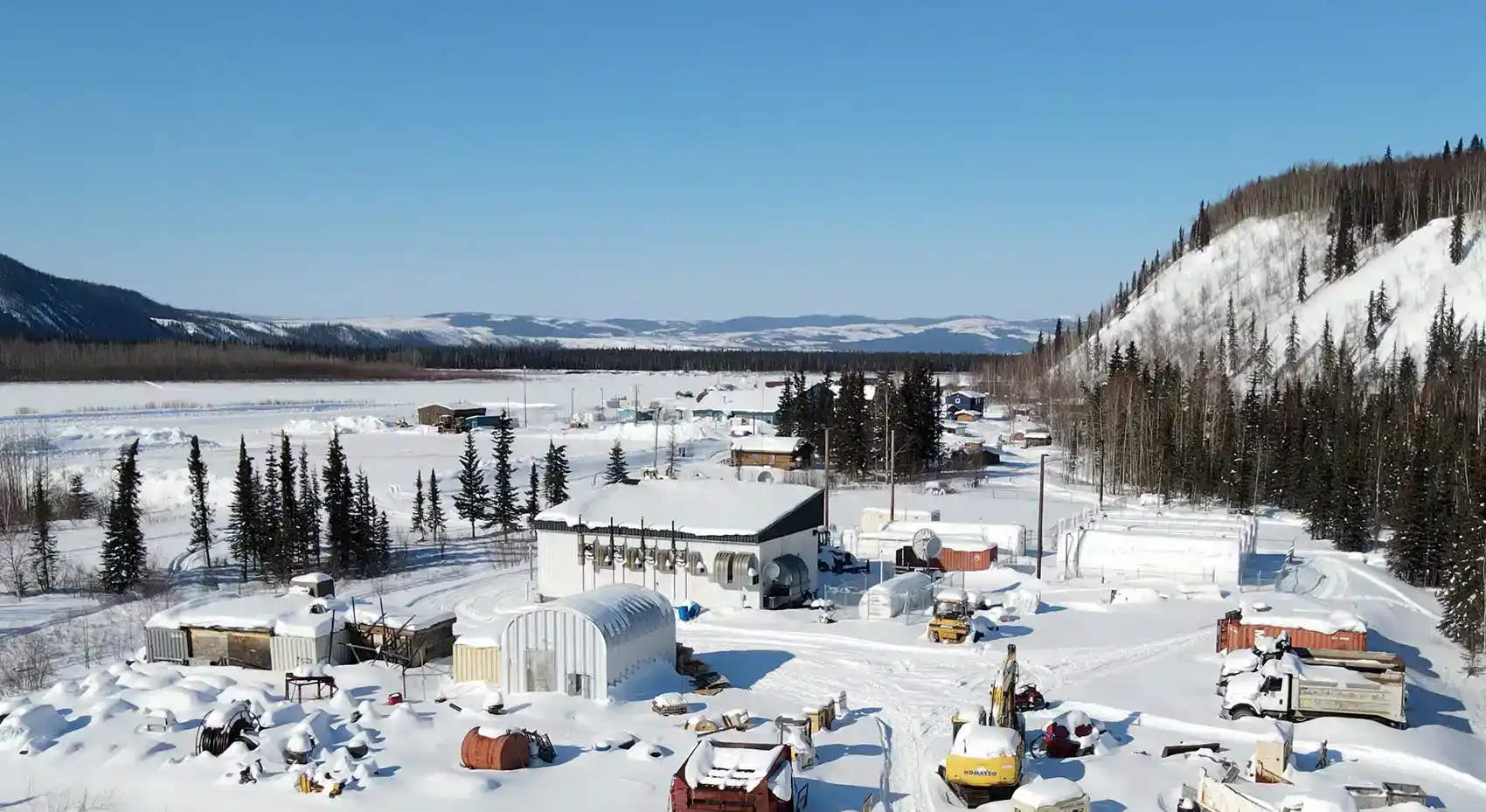 An aerial image of Hughes, Alaska, in the snow.