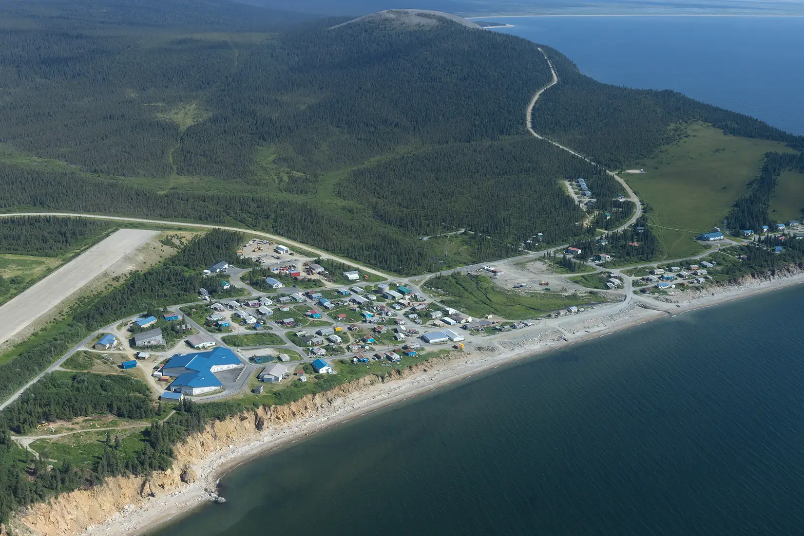 20260616-new-doe-funding-opportunity-to-strengthen-microgrids-in-remote-and-industrial-regions-elim-alaska-090695 An aerial photo of the coastal community of Elim, Alaska