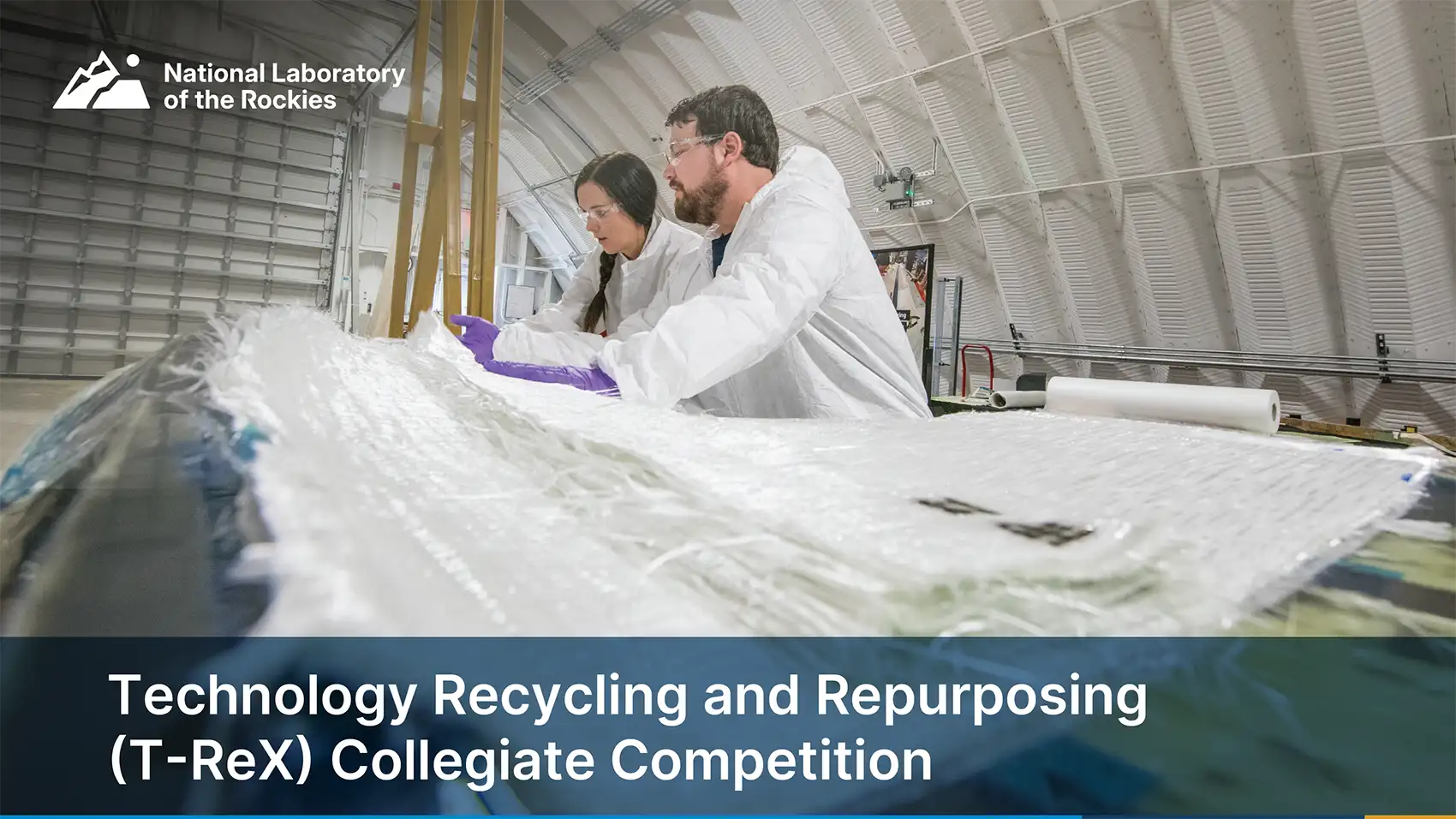 Two people in a large warehouse laboratory with the text Technology Recycling and Repurposing (T-ReX) Collegiate Competition.