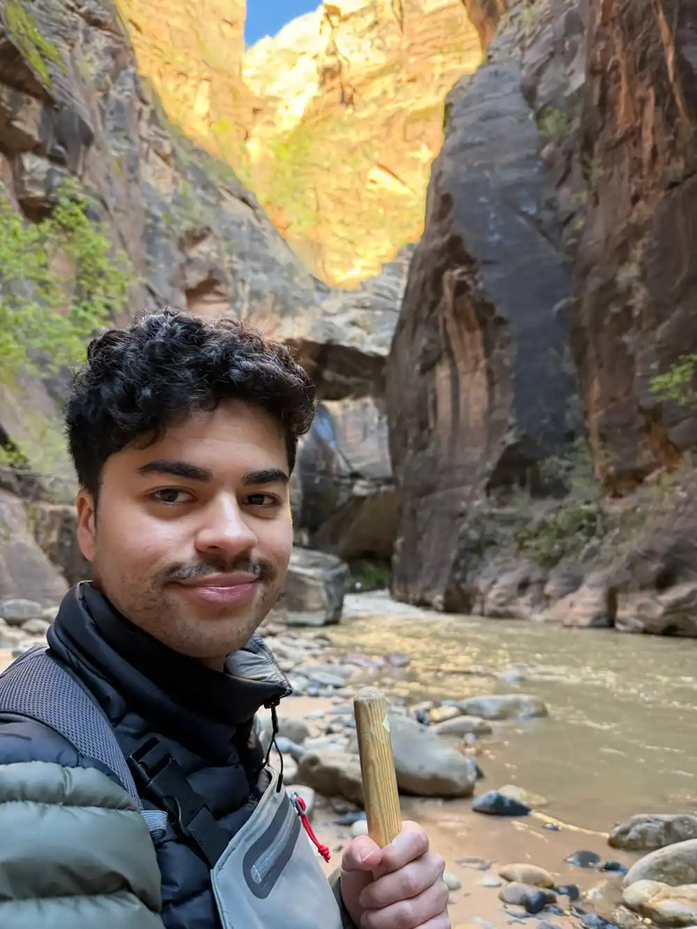 20260811-early-career-spotlight-patrick-emami-works-toward-humans-in-the-loop-with-ai-8329 Portrait of Patrick Emami hiking.